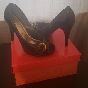 Black patent leather peep toe heels
